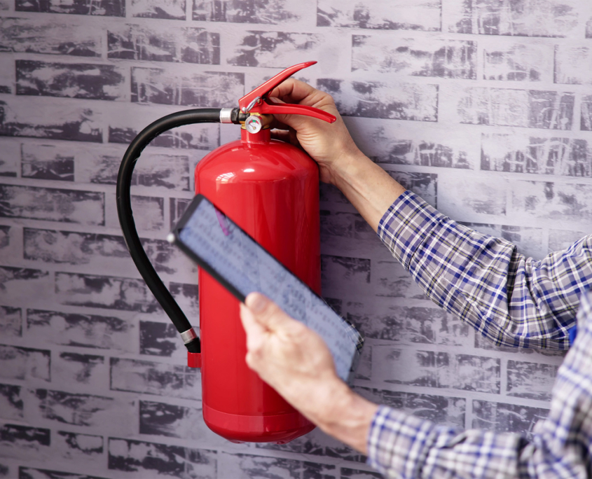 Extinguisher On Wall'