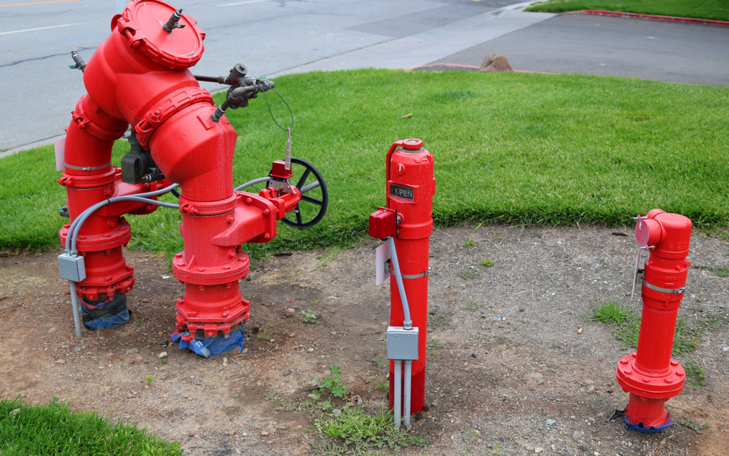 Fire Backflow Pipes Next To Road